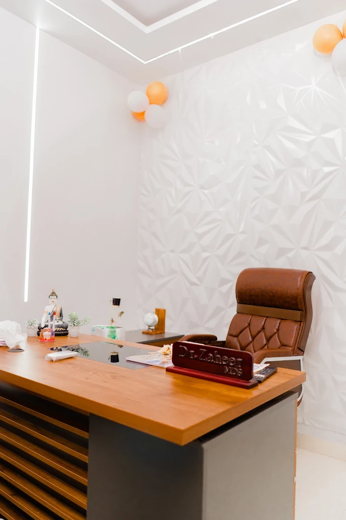 Dr. Zaheer MDS consultation office at Asha Dental Clinic